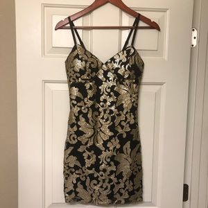 Black and gold sequenced mini dress